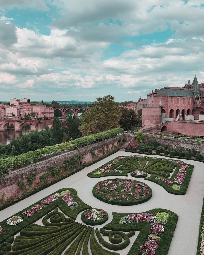 A stunning aerial shot of Albi's gardens and historic architecture in France.